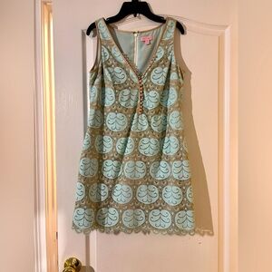 Lily Pulitzer size 6 powder blue and gold with eyelet buttons.